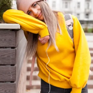 smiling woman with beanieposing 23 2148382782